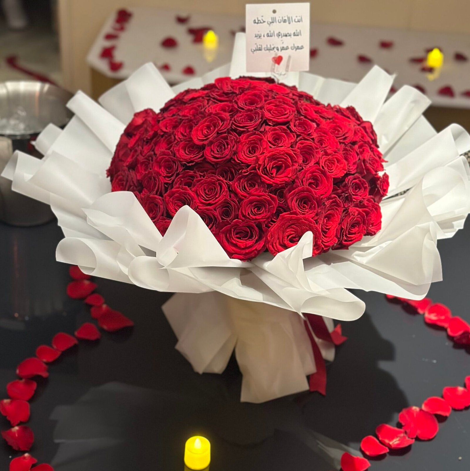 100 Red Roses Wrapped in Elegant White Cover - Image 2