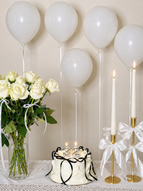 Elegant Birthday Cake with white Balloons