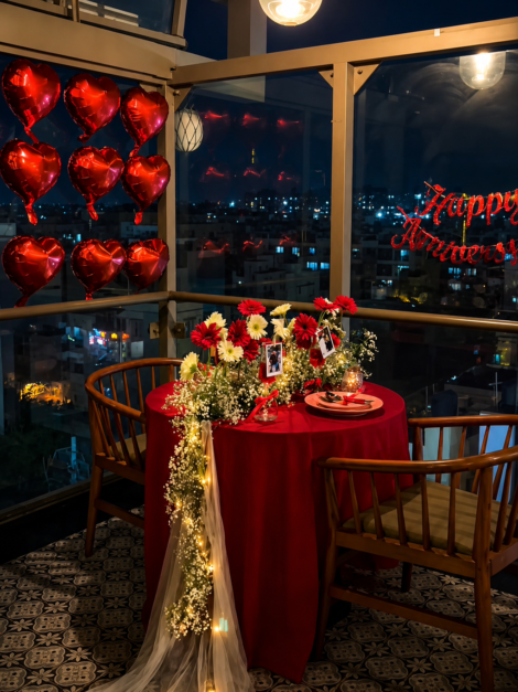 Red Romance Dinner ✨ A luxury romantic dinner setup with a stunning night view and elegant red touches ❤️ Includes red heart balloons, elegant floral styling, warm lighting, and a beautifully arranged table for unforgettable moments.